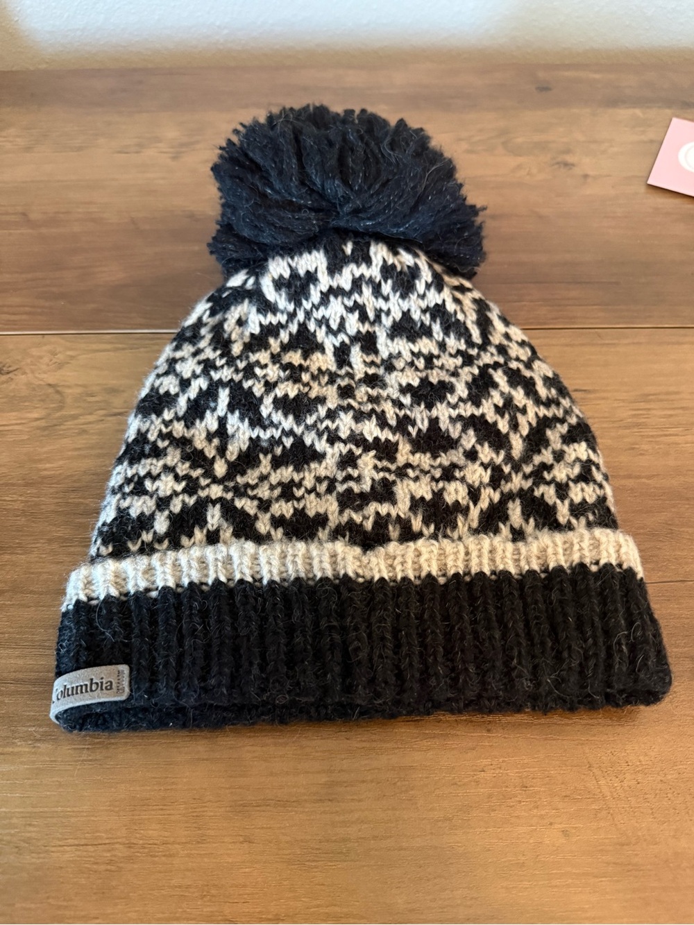 Columbia Women’s Black and Cream Pom-Pom Knit Hat